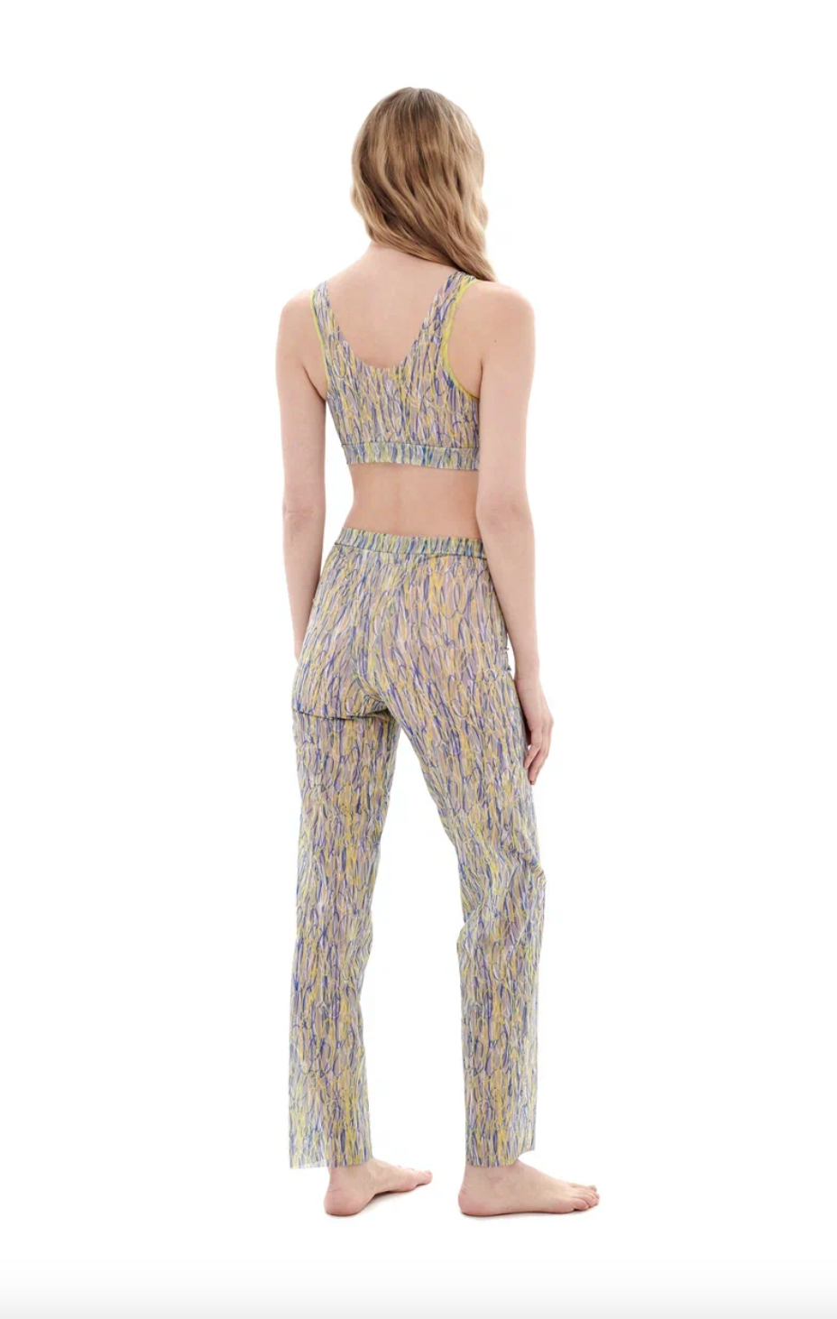 This file contains a description of a tan-through, innovative, sustainable burkini set with a 3DPen print. The set includes a top, leggings, and a tunic, offering classic luxury for modest fashion. The description also includes a call to action to shop for this stylish swimwear.