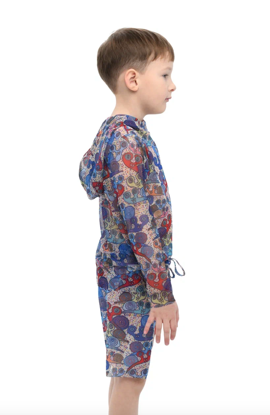 Explore our Snails print Kid's Smart T-shirt and Shorts with SPF35 protection. This file highlights eco-friendly swimwear, combining classic luxury and safety to ensure your child enjoys stylish and secure beachwear. Shop now!