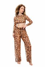 Load image into Gallery viewer, Explore sustainable tan-through smart swimwear with the iconic leopard print in this file. Featuring beach pants showcased on the runway, it offers stylish options for your vacation.
