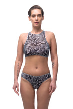 Load image into Gallery viewer, Discover sustainable tan-through smart swimsuits adorned with a trendy Fake Zebra print in this file. Featuring a sport top design, they are ideal for beach activities.
