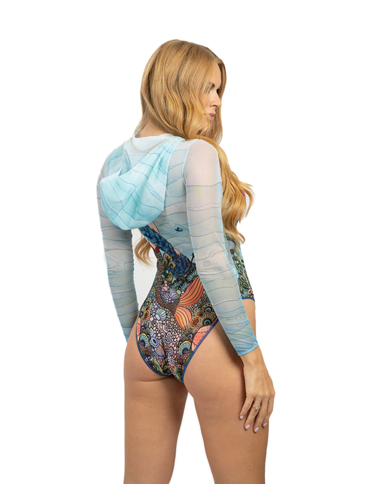 Explore our range of sustainable tan-through swimsuits with a charming mermaid print. This swimsuit offers SPF35 protection and comes with a stylish hood and lace detail for a touch of elegance.