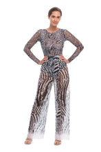 Load image into Gallery viewer, This file showcases sustainable tan-through smart swimsuits adorned with a trendy Fake Zebra print. Included are luxurious Beach Pants offering SPF35 protection for stylish sun safety.
