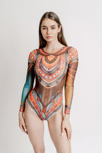 Load image into Gallery viewer, This file introduces the world&#39;s most innovative and sustainable smart swimsuit brand. Featuring the Africa print, the one-piece with sleeves offers tan without tan lines technology, perfect for individuals with visual impairment or low-bandwidth connections
