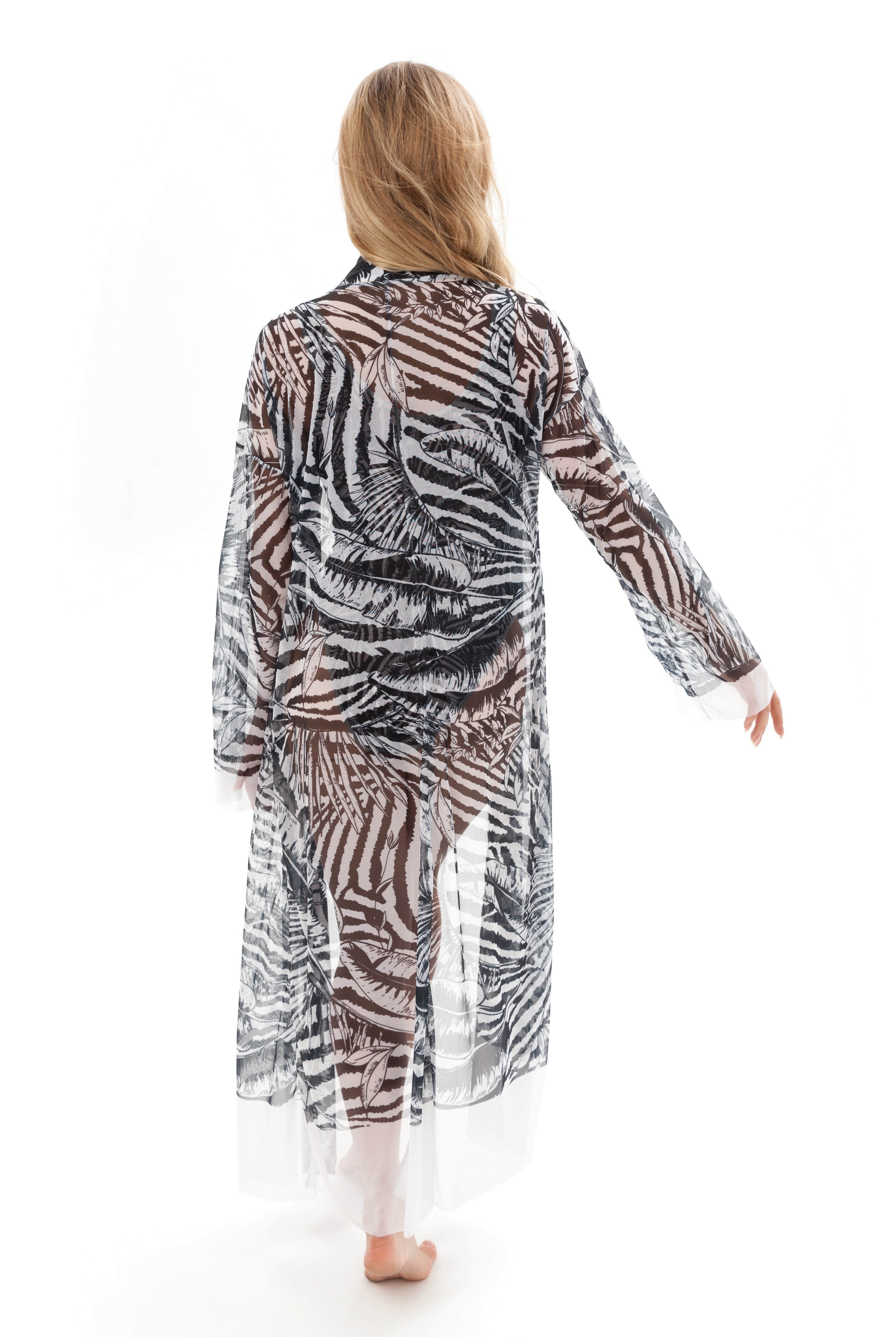 This file showcases sustainable tan-through smart swimsuits featuring a trendy Fake Zebra print. It includes a Beach Robe offering SPF35 protection, embodying a new classic beachwear style