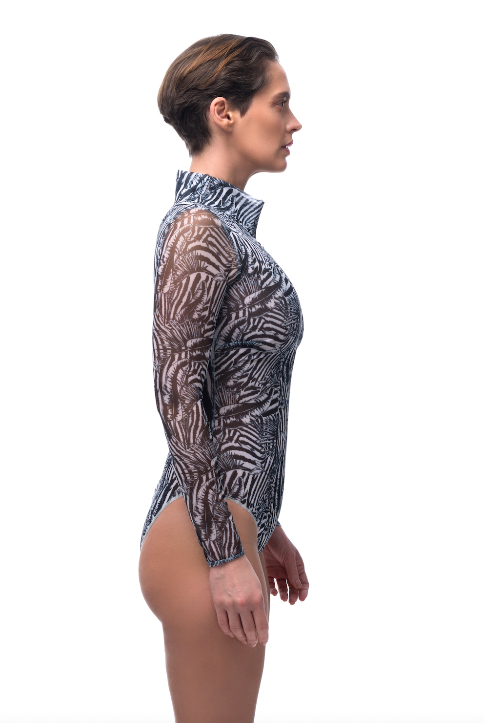 Explore sustainable tan-through smart swimsuits adorned with a trendy Fake Zebra print in this file. Featuring a zipper design with sleeves, they offer both style and sun protection.