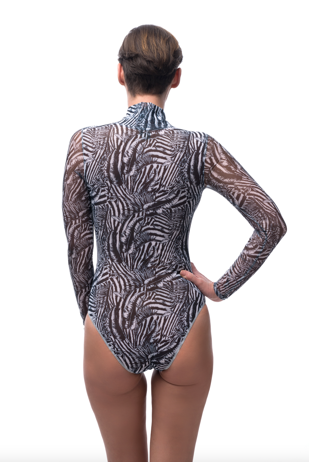 This file features sustainable tan-through smart swimsuits adorned with a trendy Fake Zebra print. Included is a zipper swimsuit with sleeves, offering both style and sun protection.