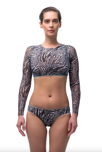 This file features sustainable tan-through smart swimsuits adorned with a trendy Fake Zebra print. Included is a classic bikini offering SPF35 protection, perfect for sun-safe beach outings.