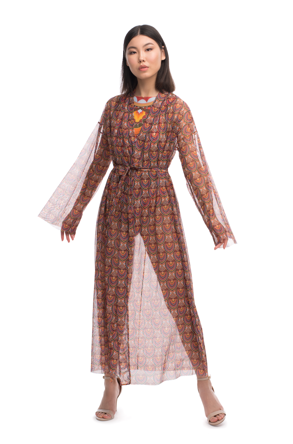 This file provides a concise overview of a sustainable smart swimwear product: the Africa print beach robe. With SPF 15 protection and tan-without-tan-lines technology, it's a stylish choice for sun safety
