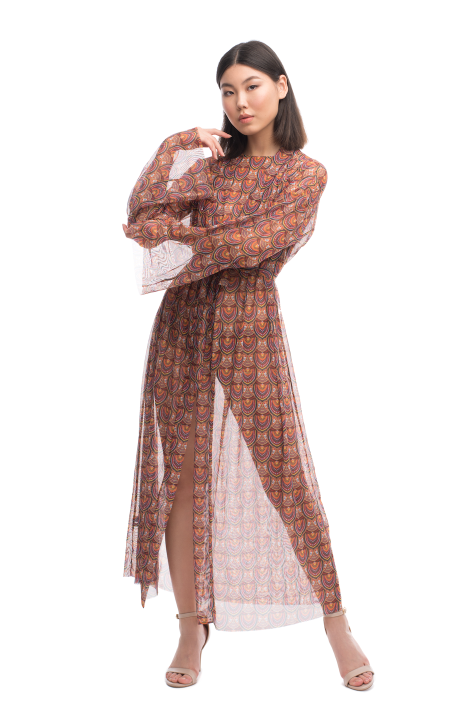 This file offers a concise overview of a sustainable Africa print beach robe with SPF 15 protection and tan-without-tan-lines technology. Ideal for individuals with visual impairments or low-bandwidth connections seeking stylish and sun-safe beach attire
