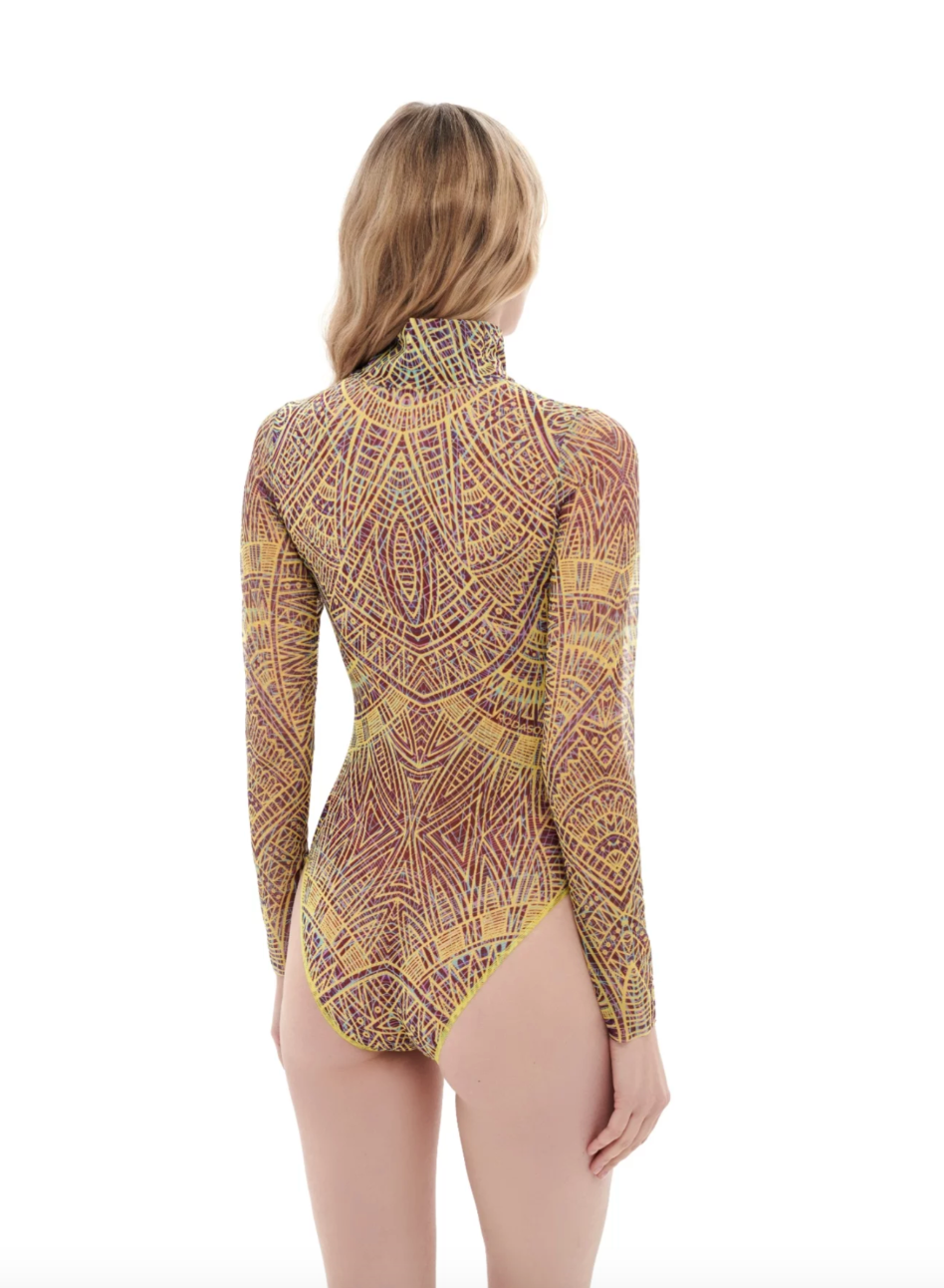 This file offers details about a sustainable one-piece swimsuit with sleeves, featuring a zipper and the Eldorado print. Tailored for those with visual impairment or low-bandwidth connections seeking eco-friendly swimwear options