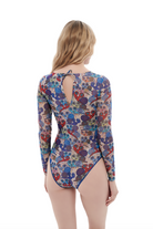This file showcases sustainable tan-through smart swimsuits featuring a playful Snails print. With a one-piece swimsuit design and sleeves, it adds a touch of fun art to your beachwear.
