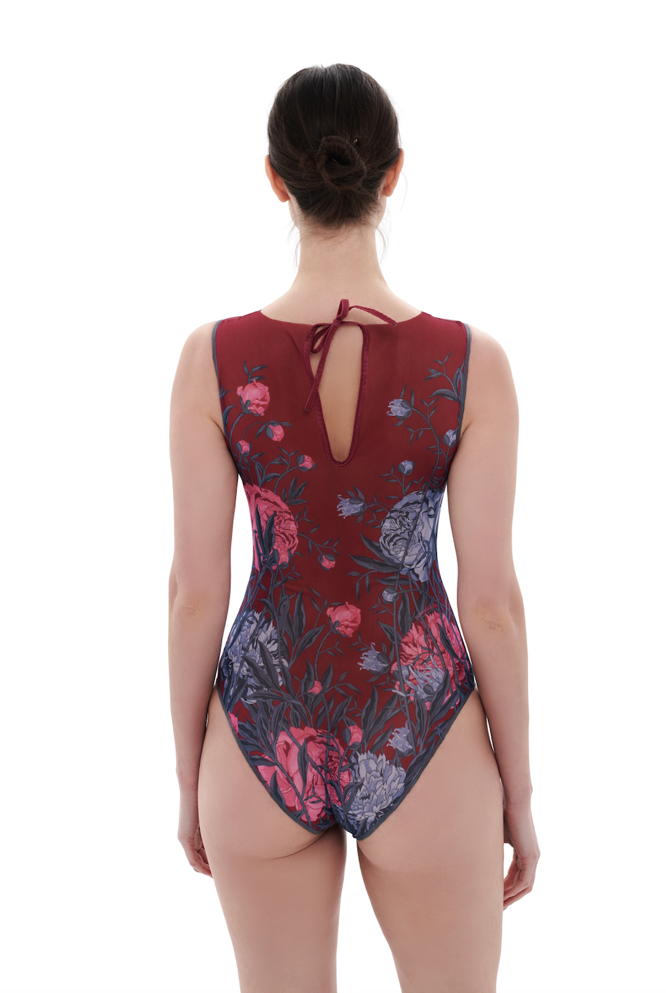 Discover sustainable tan-through smart swimsuits featuring a chic peonies print in this file. Included is a sleeveless one-piece, providing luxurious sun protection and a perfect silhouette for your beach adventures.