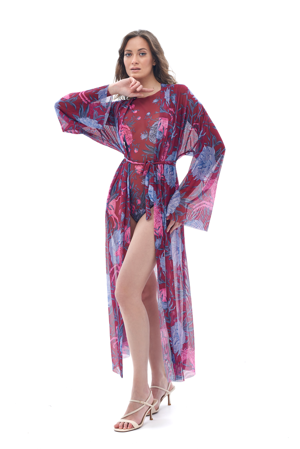  Discover sustainable tan-through smart swimsuits in a chic peonies print. This file includes a beach robe, offering both style and sun protection with an SPF15 rating.