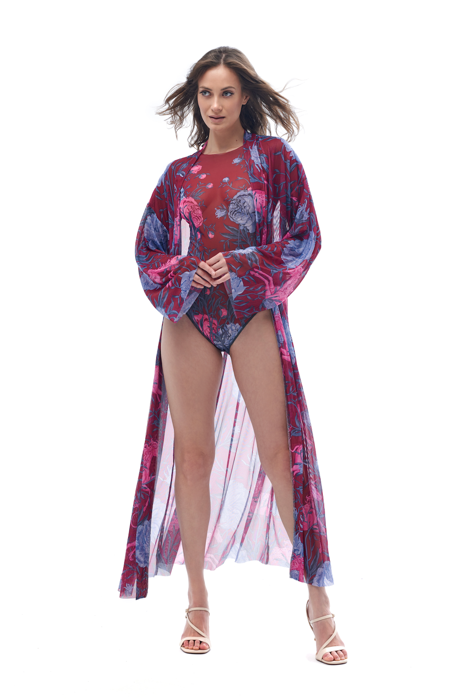  Discover sustainable tan-through smart swimsuits adorned with a stylish peonies print in this file. Included is a beach robe, offering luxurious sun protection and a perfect silhouette.