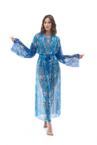  This file offers a collection of sustainable tan-through smart swimsuits with a beautiful peacock print. Included are beach robes, perfect for those seeking classic luxury and timeless elegance.