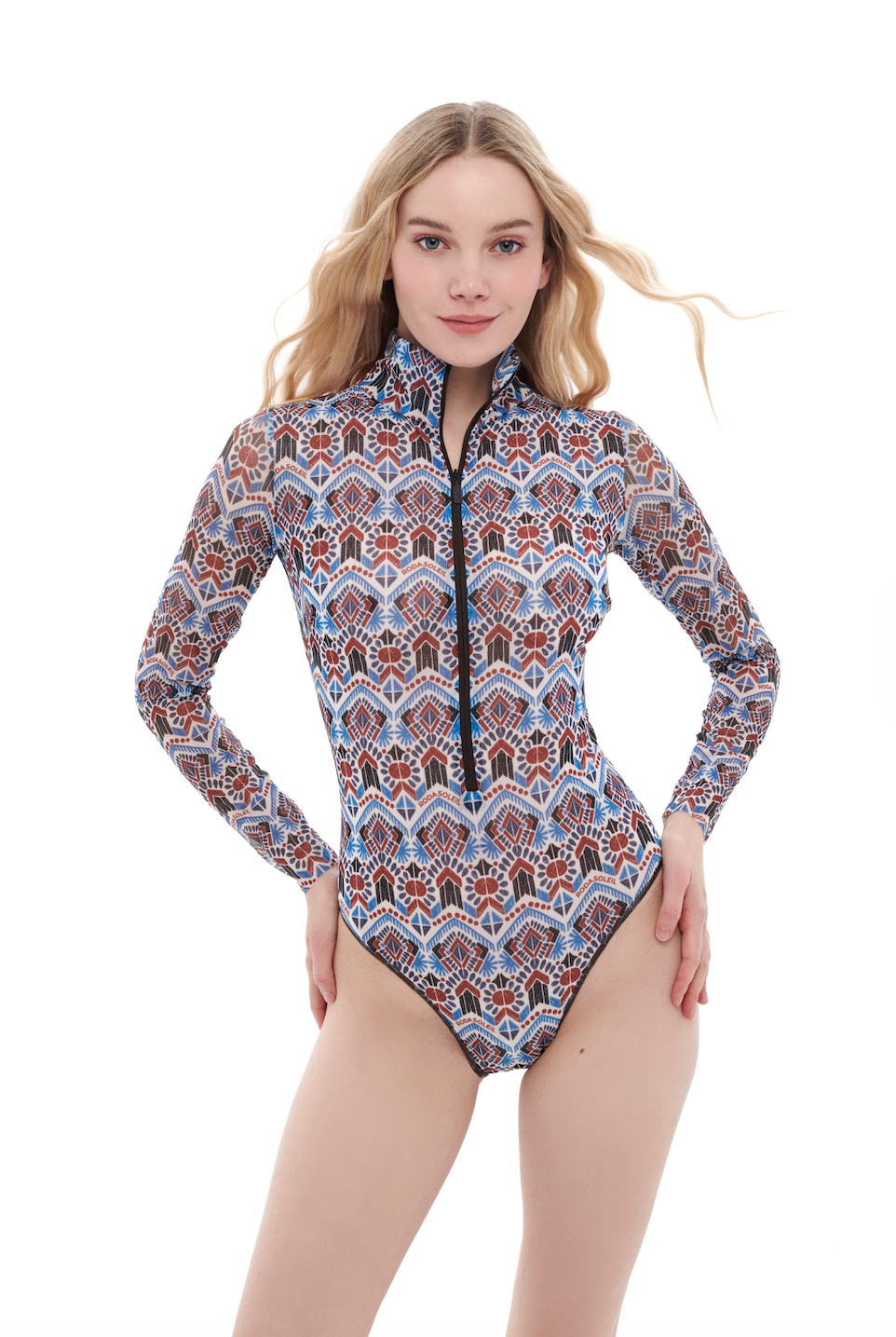  This file contains information about Marrakesh print swimsuits, featuring sleeves, a zipper, and SPF35 protection. It showcases sustainable fashion for beachgoers seeking classic luxury.