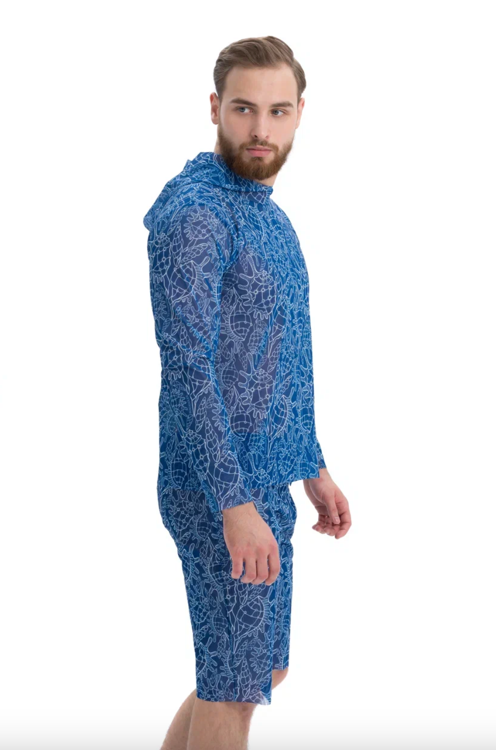 This file contains a description of a tan-through Men's Smart T-shirt with and without Hood in SHELLS print. It is innovative, sustainable, and offers SPF protection and classic luxury for modest fashion. Shop now!