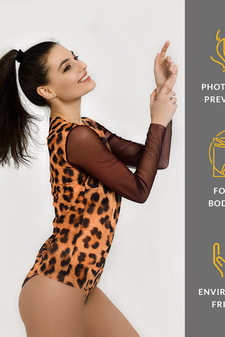 This file contains information about tan-through t-shirts featuring a leopard print design. These shirts offer SPF15 protection and embody classic luxury with their sustainable and stylish design.