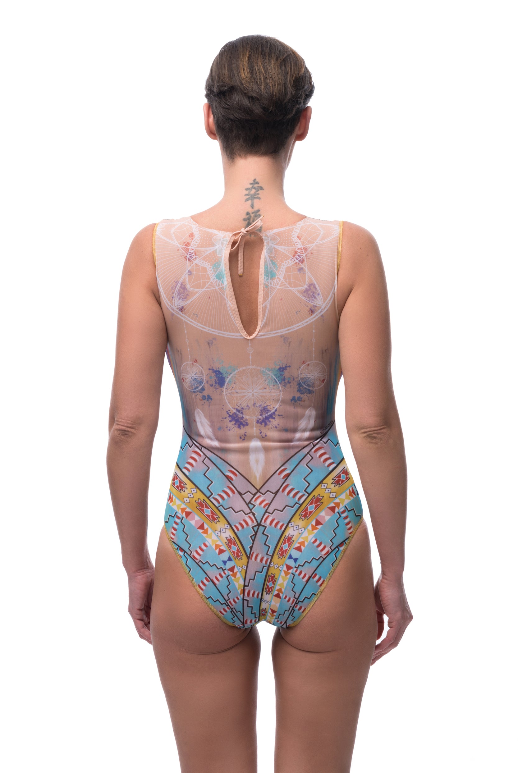 This file introduces a collection of luxury smart swimsuits featuring the iconic dreamcatcher print. With tan-through fabric and SPF 35 protection, these sleeveless one-pieces offer sophistication and style for summer