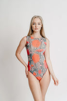 Explore our range of sustainable smart swimsuits in an appealing spikes print. With sleeveless options available and a current sale, enjoy classic luxury while staying stylish on the beach. Shop now!