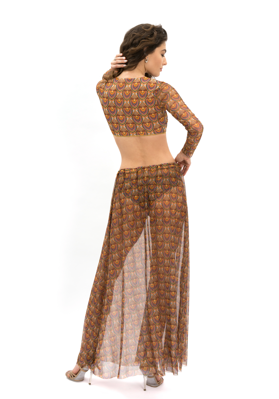 This file offers a concise overview of a sustainable smart swimwear product: the Africa print beach skirt. It features SPF 15 protection and tan-without-tan-lines technology, catering to individuals with visual impairment or low-bandwidth connections